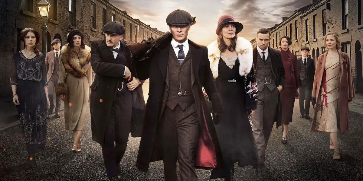 The cast of Peaky Blinders walking on a street for the show